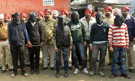 Indian police present six arrested men, accused of a gang rape in Punjab state.
